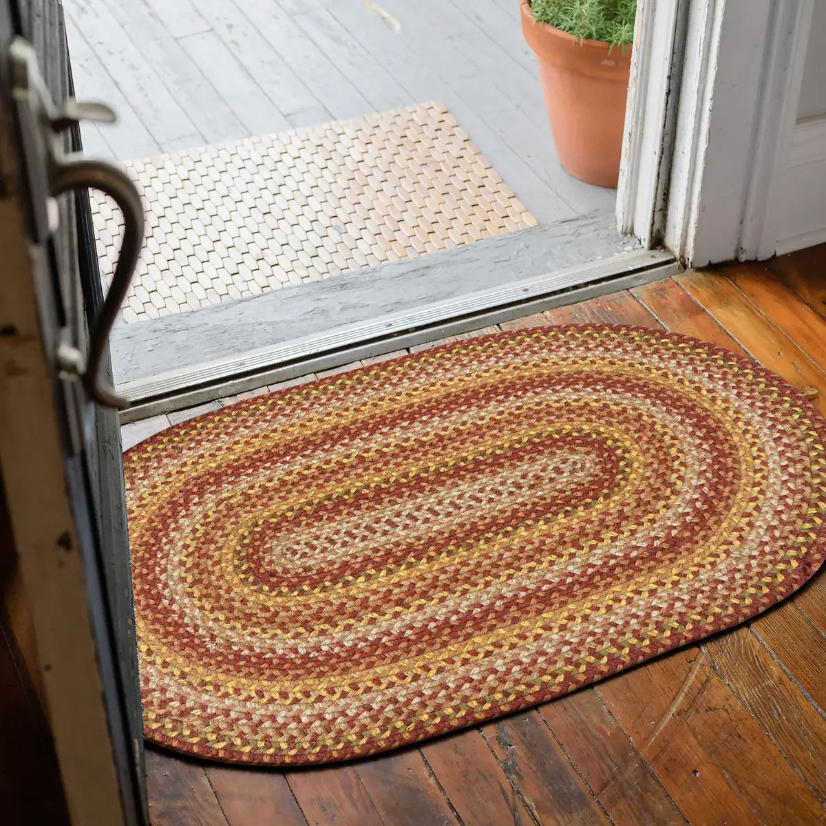 Amber Leaf Brick Red Jute Braided Round Rugs